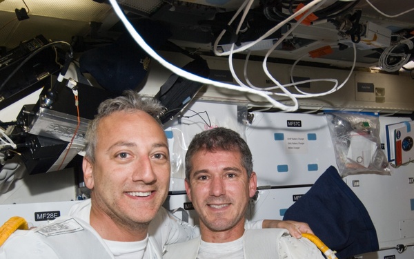 STS-125 MS1 Good and MS4 Massimino after completing EVA4