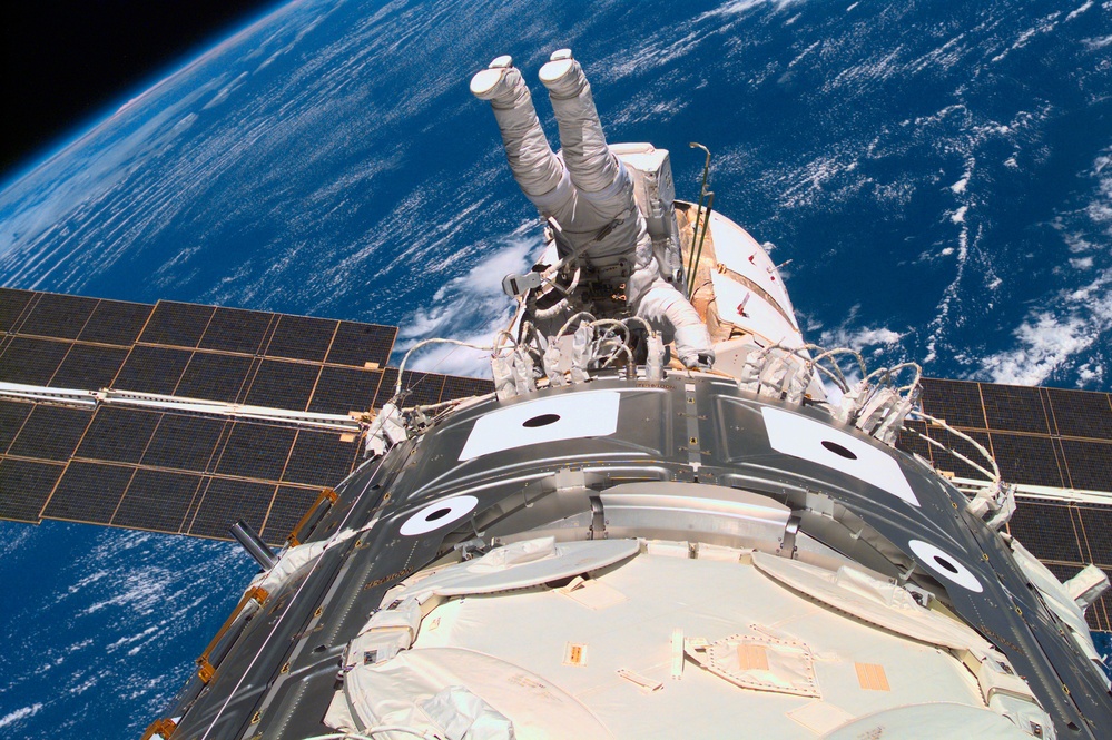 Newman during EVA 3 working on cables