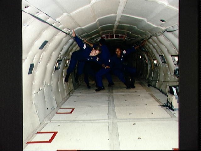Group 12 ASCANs Davis and Jemison during zero gravity training aboard KC-135
