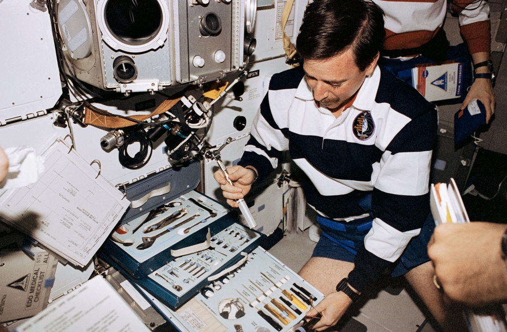 Astronaut Horowitz with tools