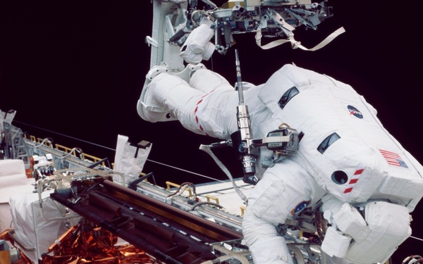 EVA 2 - old solar array installed in payload bay