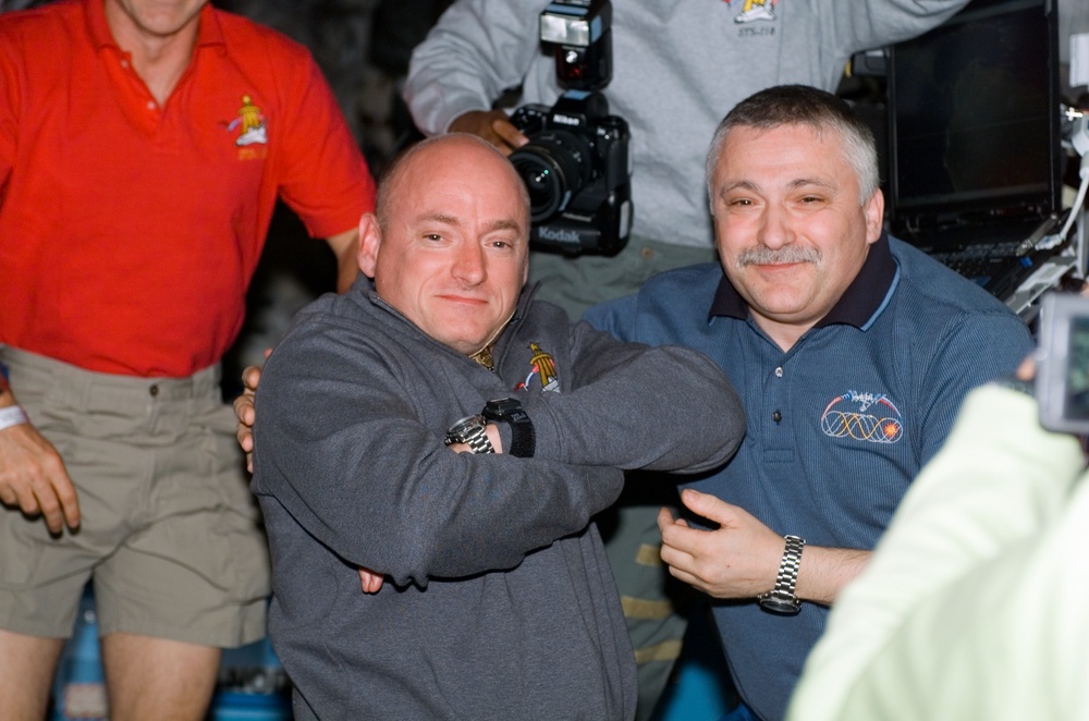 View of Kelly and Yurchikhin posing together during STS-118/Expedition 15 Joint Operations
