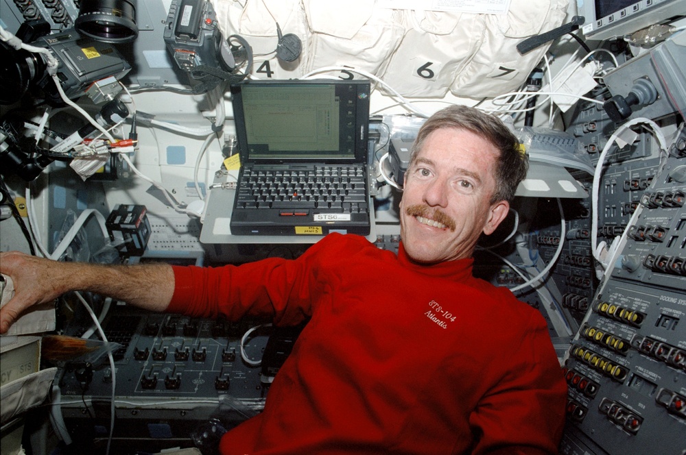 STS-104 MS Reilly on Atlantis aft flight deck