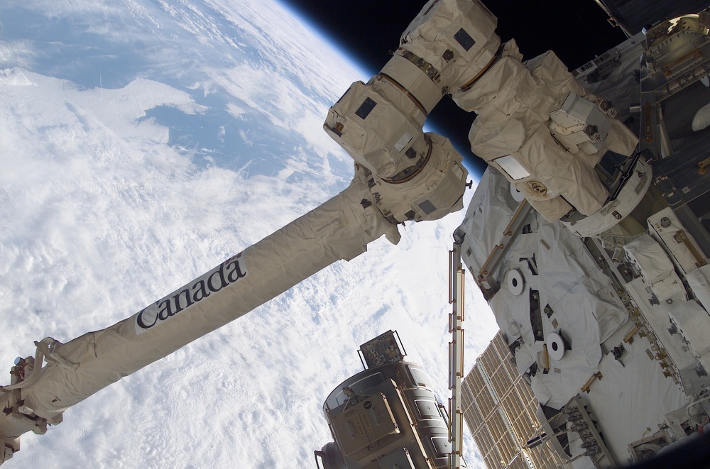 Canadarm2 SSRMS grappled to the MBS during STS-111 UF-2 installation OPS on the ISS truss structure