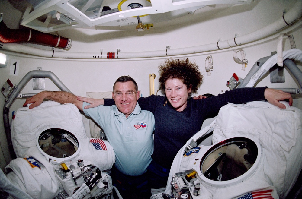 STS-102 crewmember activities in the middeck