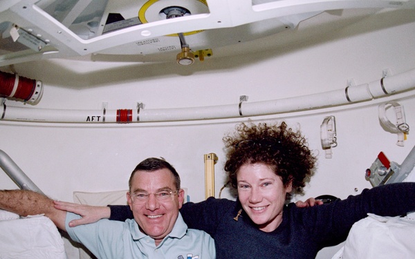 STS-102 crewmember activities in the middeck