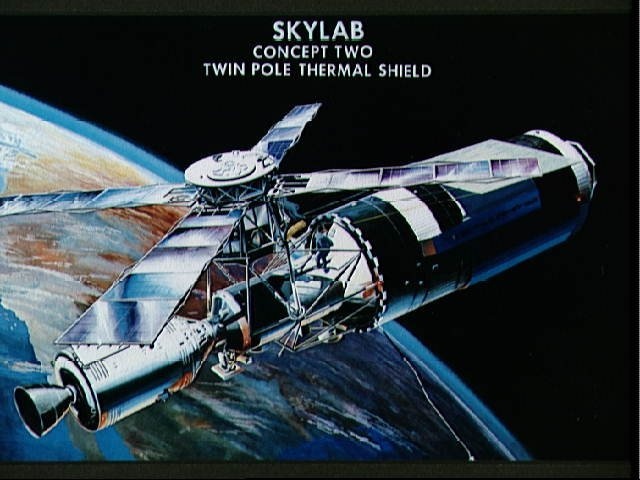 Artist's concept of deployment of twin pole thermal shield on Skylab