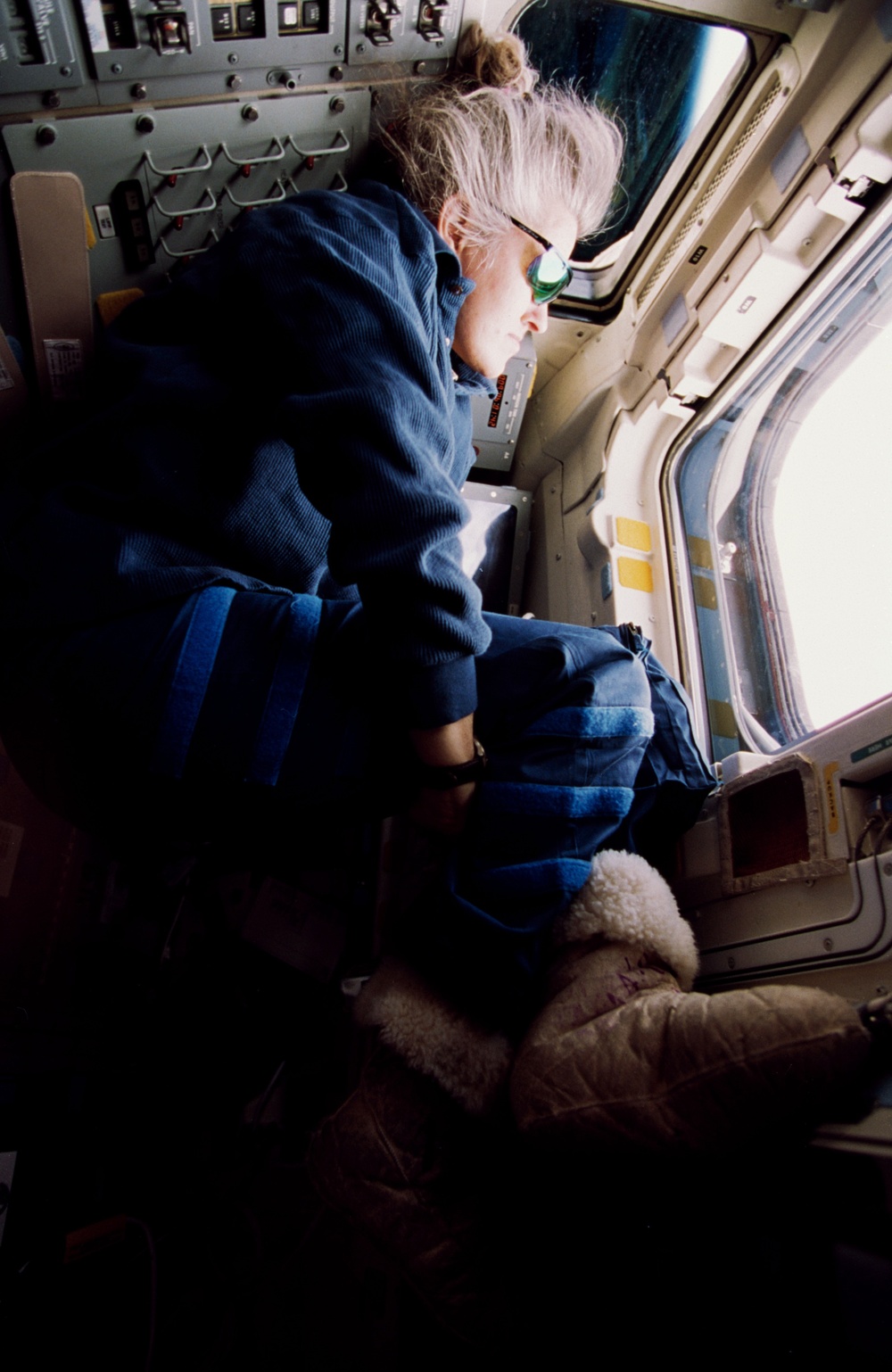 Candid views of the STS-79 crew on the orbiter Atlantis