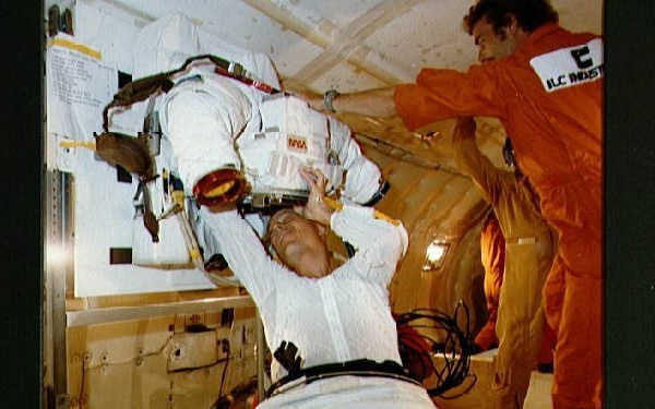 Spacsuit donning and doffing in zero-g training for Story Musgrave STS-6