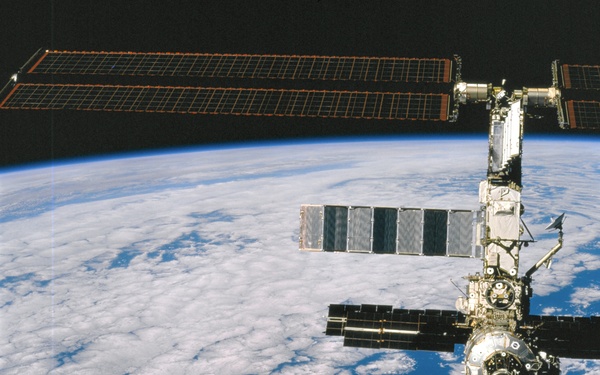 Forward view of the ISS taken during the final flyaround of the STS-100 mission