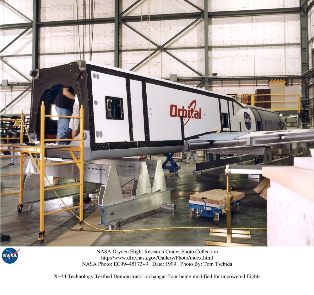 X-34 Technology Testbed Demonstrator on hangar floor being modified for unpowered flights