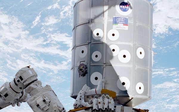 MS Hadfield working on Destiny during the second EVA of STS-100