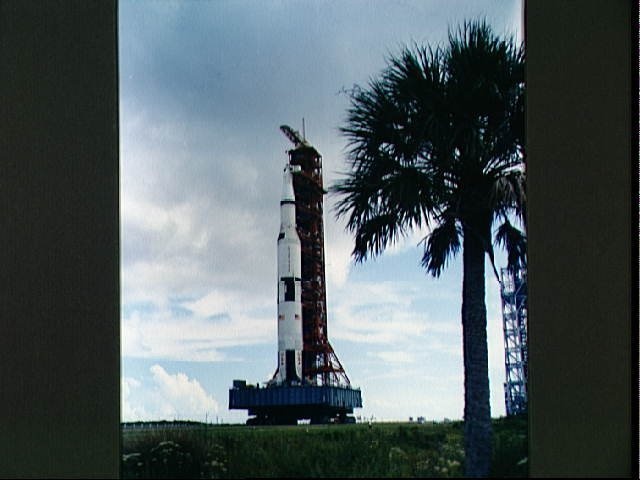 Apollo 4 stack and mobile launch tower moving from VAB toward launch pad