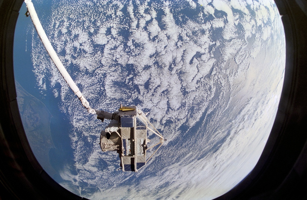 CRISTA-SPAS satellite on Atlantis' RMS arm during STS-66