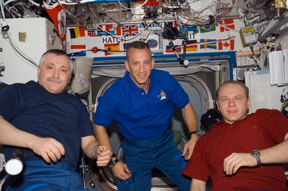 View of Crewmember posing for a photo in the US Lab during STS-118/Expedition 15 Joint Operations