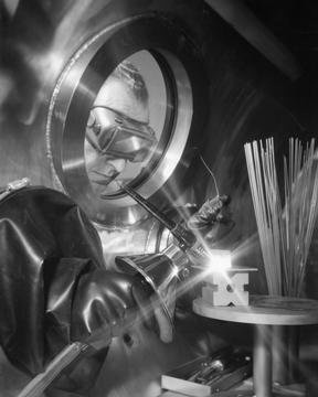 TIG WELDER LOCATED IN THE CLEAN ROOM OF THE TECHNICAL SERVICES BUILDING TSB - THE INERT GAS WELDING