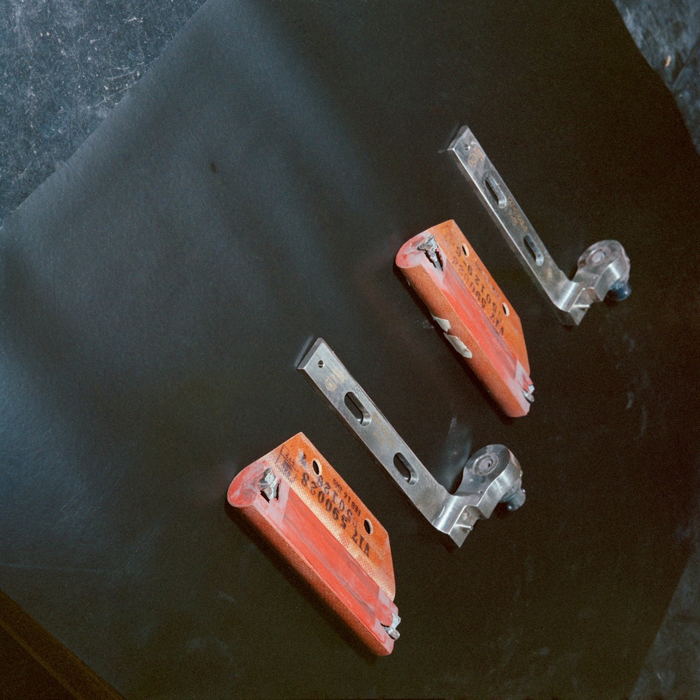 APOLLO TENSION TIE CUTTER ASSEMBLIES AFTER SECOND LEVEL VIBRATION BUILDING 352