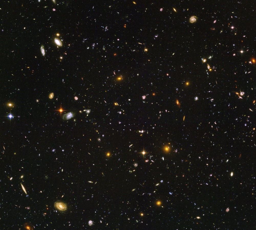 Hubble and Spitzer Space Telescopes Find &quot;Lego-Block&quot; Galaxies in Early Universe