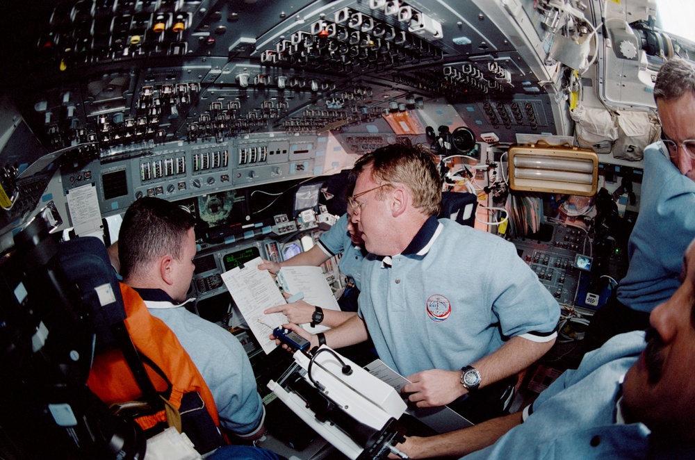 STS-102 flight deck activity during rendezvous ops with the ISS