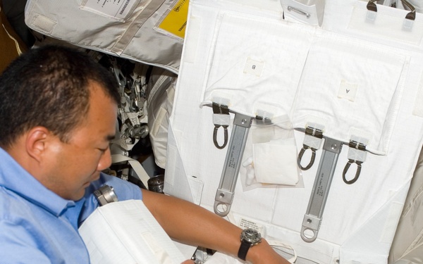 Soichi Noguchi with tool kit