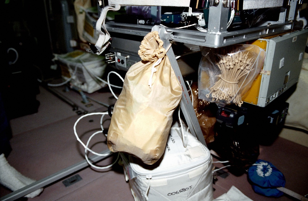 Stowage bag attached to ward room table in Zvezda SM