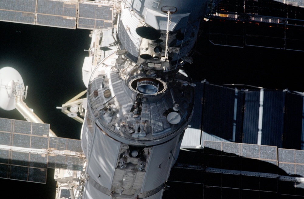 Dark view of FGB/Zarya and Zvezda Service module seen during flyaround