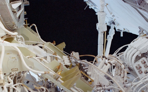 View of the aft avionics tray between the Z1 and S0 Trusses taken during the fourth EVA of STS-110