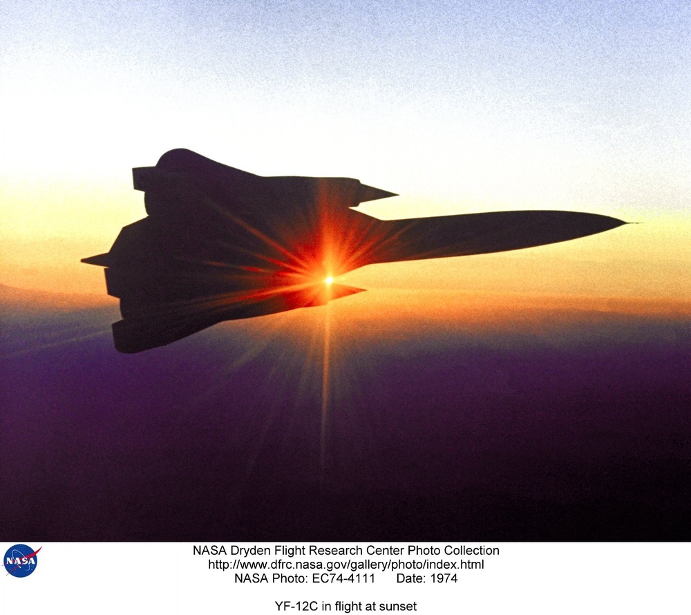 YF-12C in flight at sunset