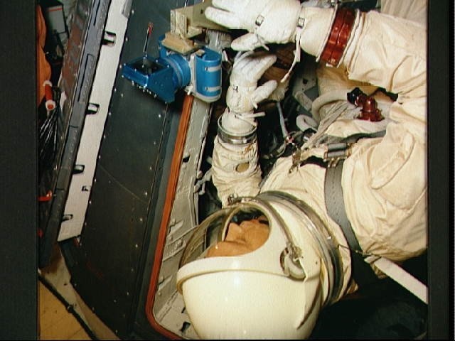 Astronaut Michael Collins during egress training aboard KC-135