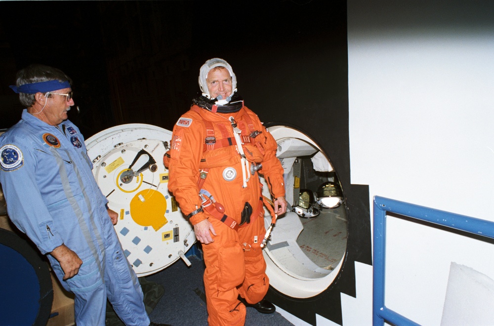 Astronaut David Walker near hatch of CCT