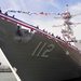 Sailors board USS Michael Murphy during commissioning ceremony