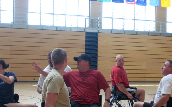 DCMA SE employees sit down for basketball with Wounded Warriors
