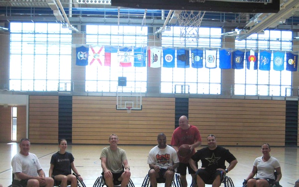 DCMA SE employees sit down for basketball with Wounded Warriors