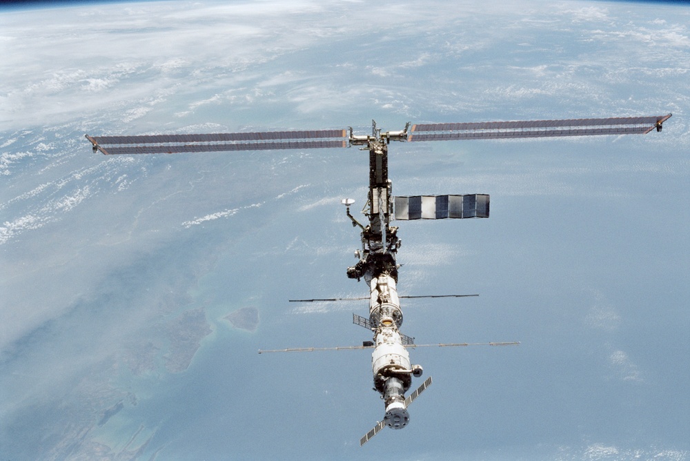 Various views of the ISS during flyaround backdropped by the Earth