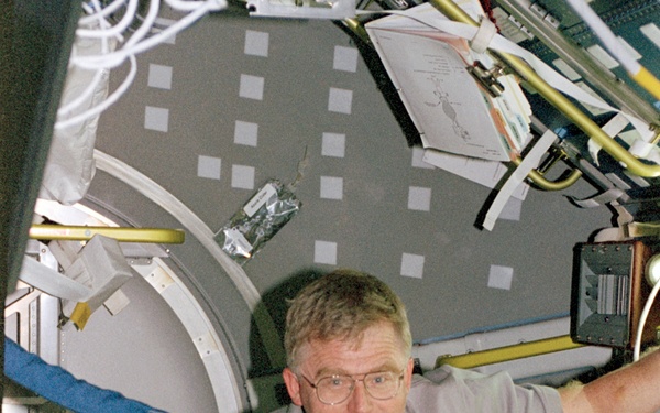 Crewmember activity in the Spacelab module