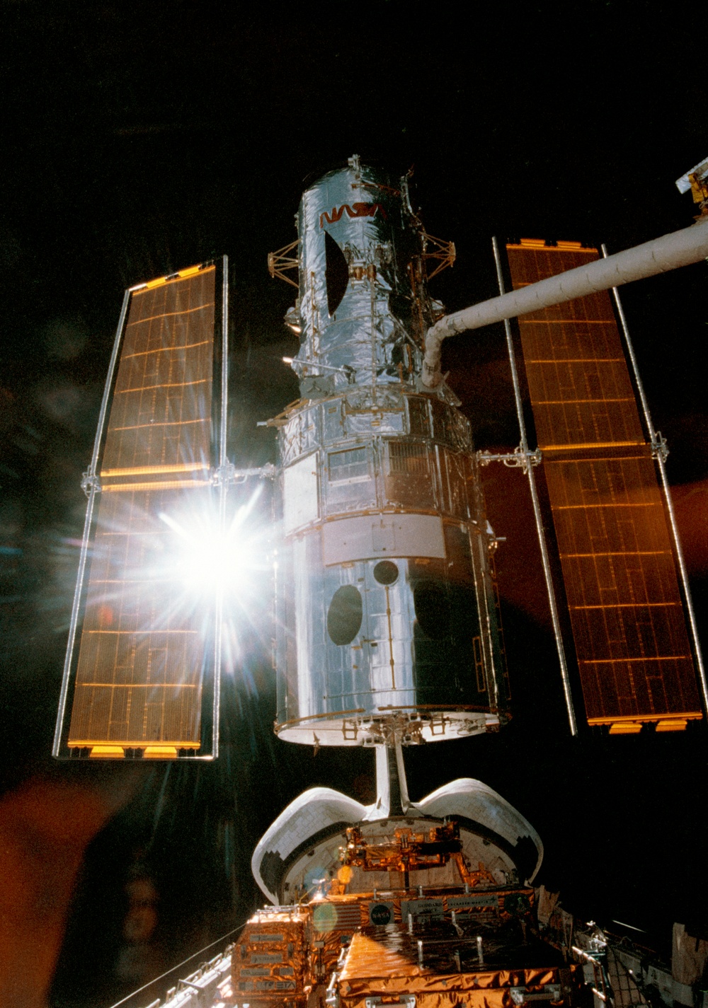 HST, deployment of the telescope by the RMS arm