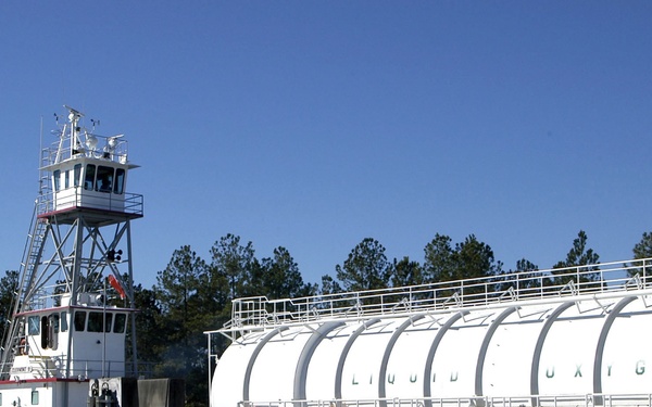 Tug Clermont II moves a LOX-filled barge on the canal