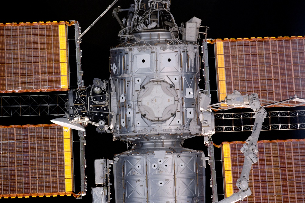 Nadir view of Destiny lab and Node 1/Unity modules seen during approach for docking