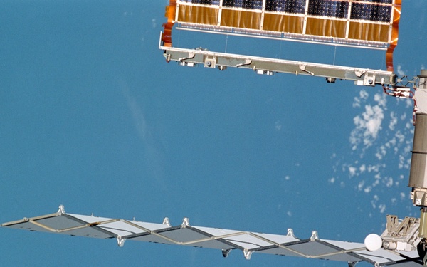 Exterior view of ISS during flyaround by STS-105 showing P6 radiator