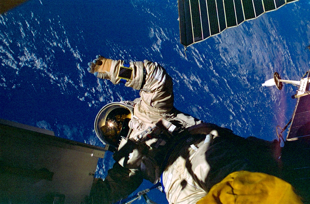 Lineger and Tsibliev during EVA outside Mir Space Station