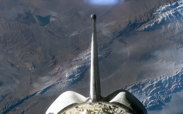 Spacehab in Columbia's PLB backdropped against the Earth during STS-107