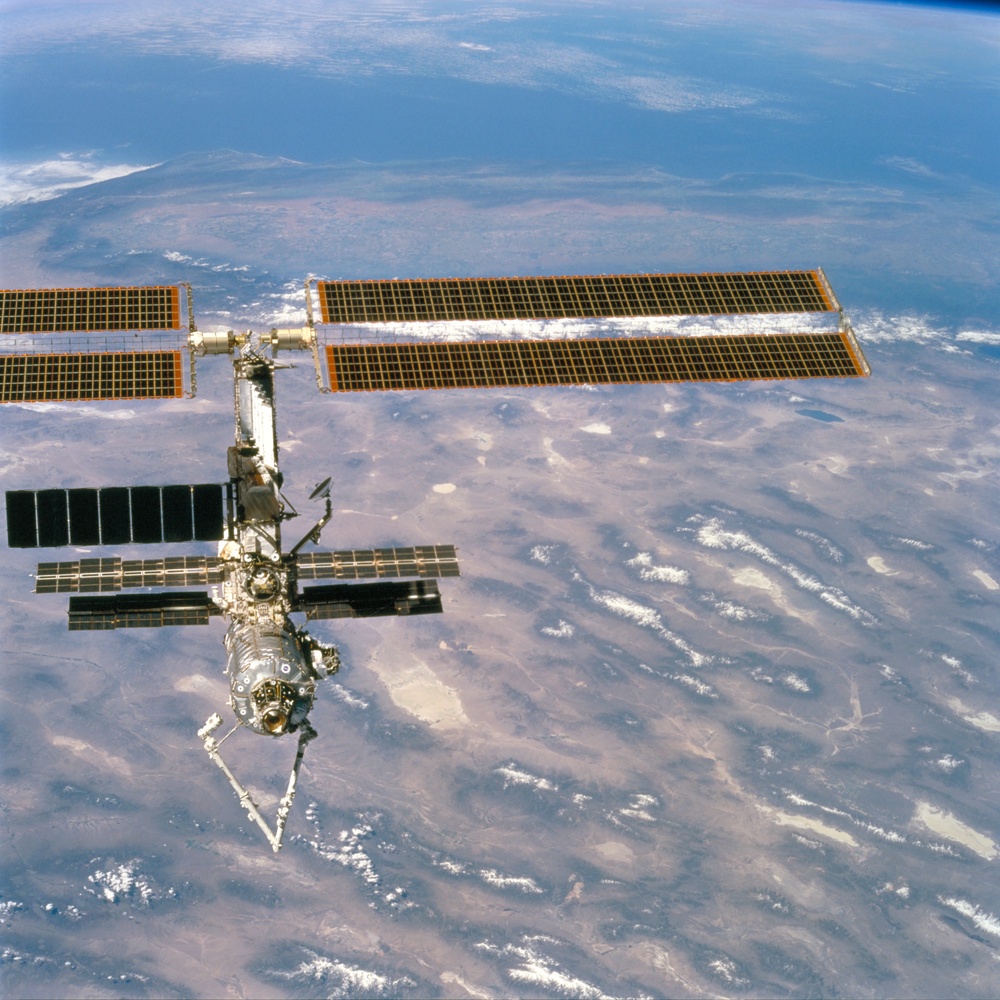 Forward view of the ISS taken during the final flyaround of the STS-100 mission