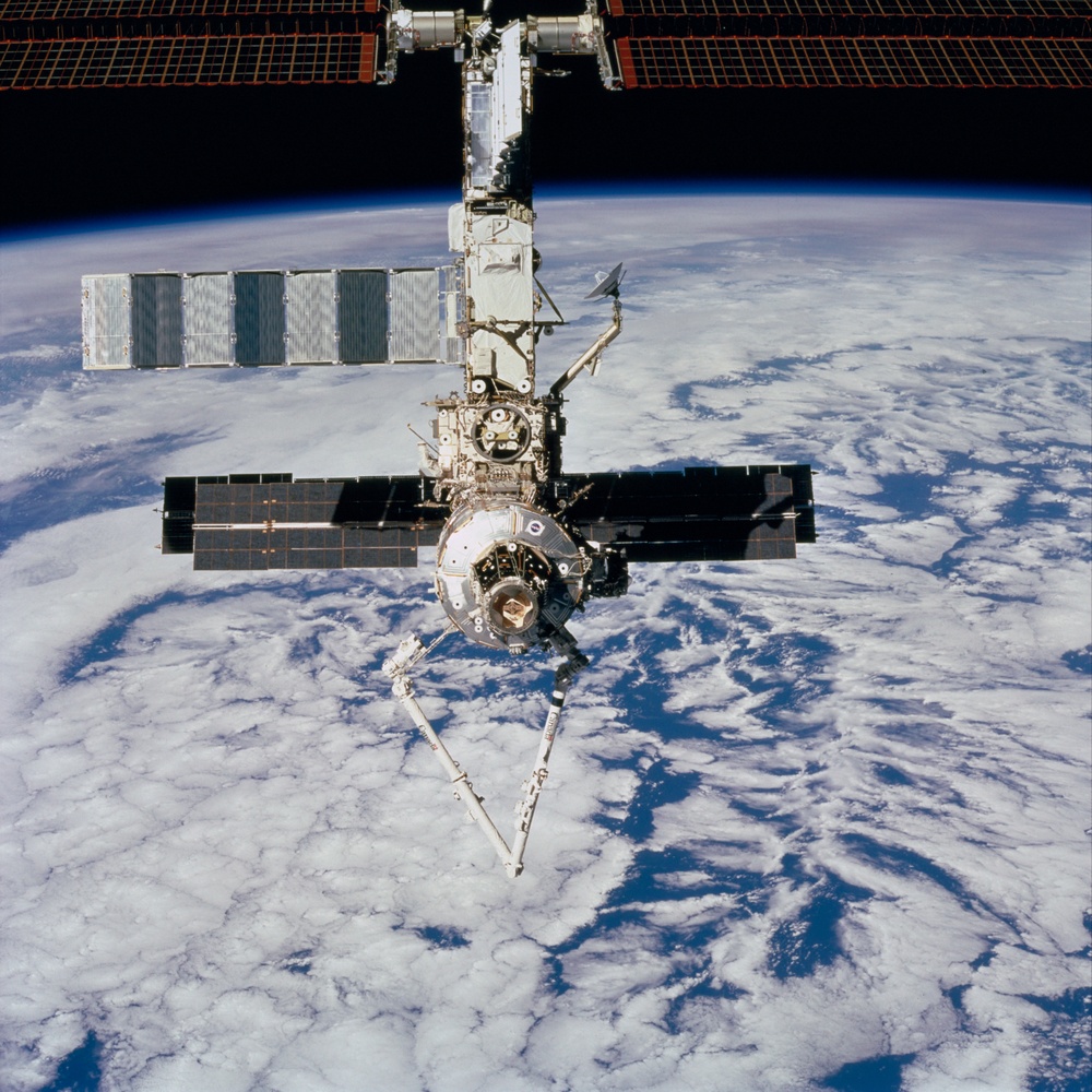 Forward view of the ISS taken during the final flyaround of the STS-100 mission