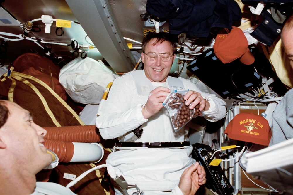 Ross and Newman prepare for their EVA on the middeck