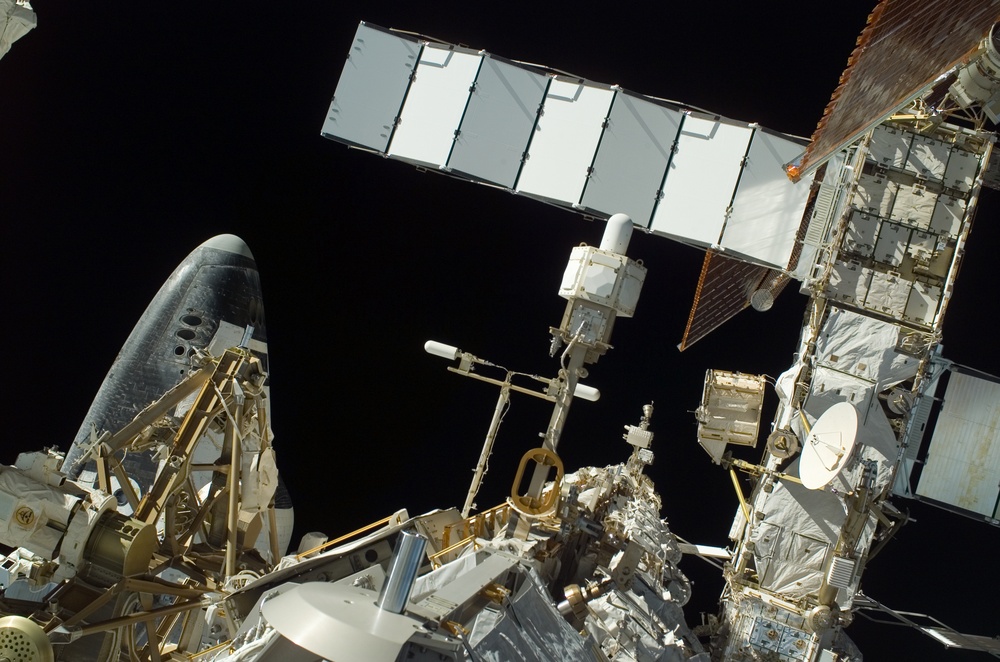 EVA view of the P1 Truss aft radiator and port side of the P6 Truss and Z1 Truss during STS-115 mission