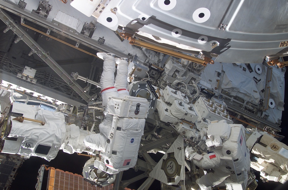 Chang-Diaz and Perrin work at the MBS on the S0 S-zero truss during STS-111 UF-2 EVA 2
