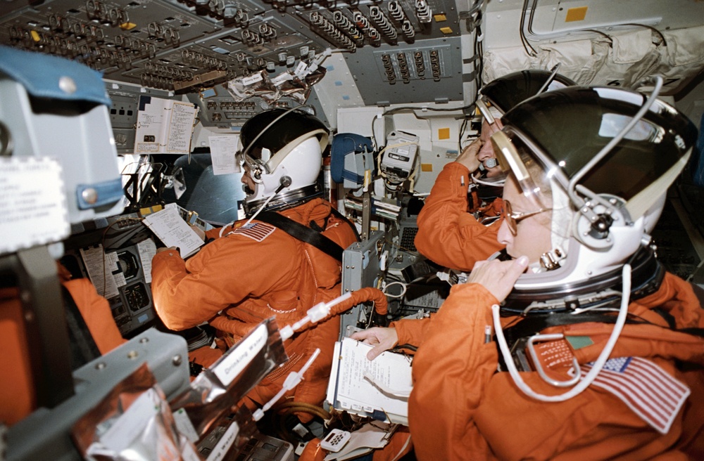 STS-46 crew, wearing LESs, prepares for deorbit on OV-104's flight deck