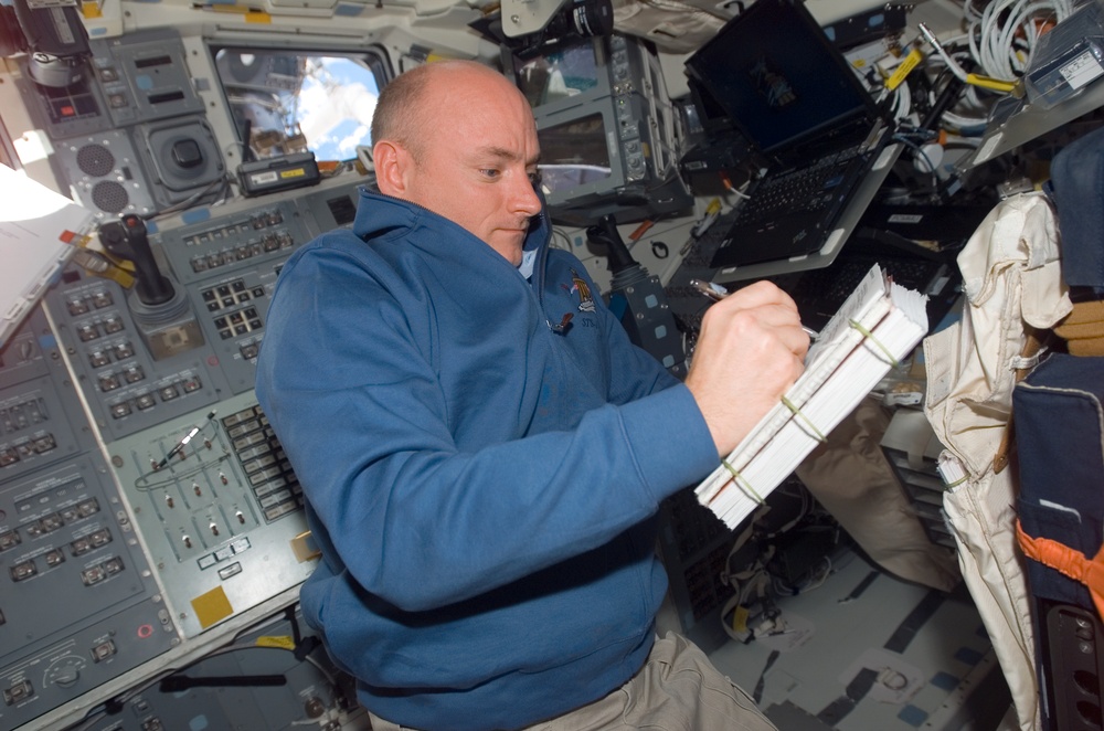 View of CDR Kelly working in the FD of the Shuttle Endeavour during STS-118