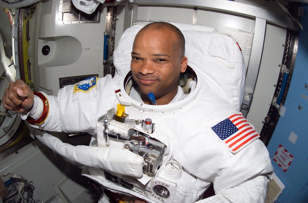 STS-116 MS Curbeam wearing EMU in the A/L after EVA 1