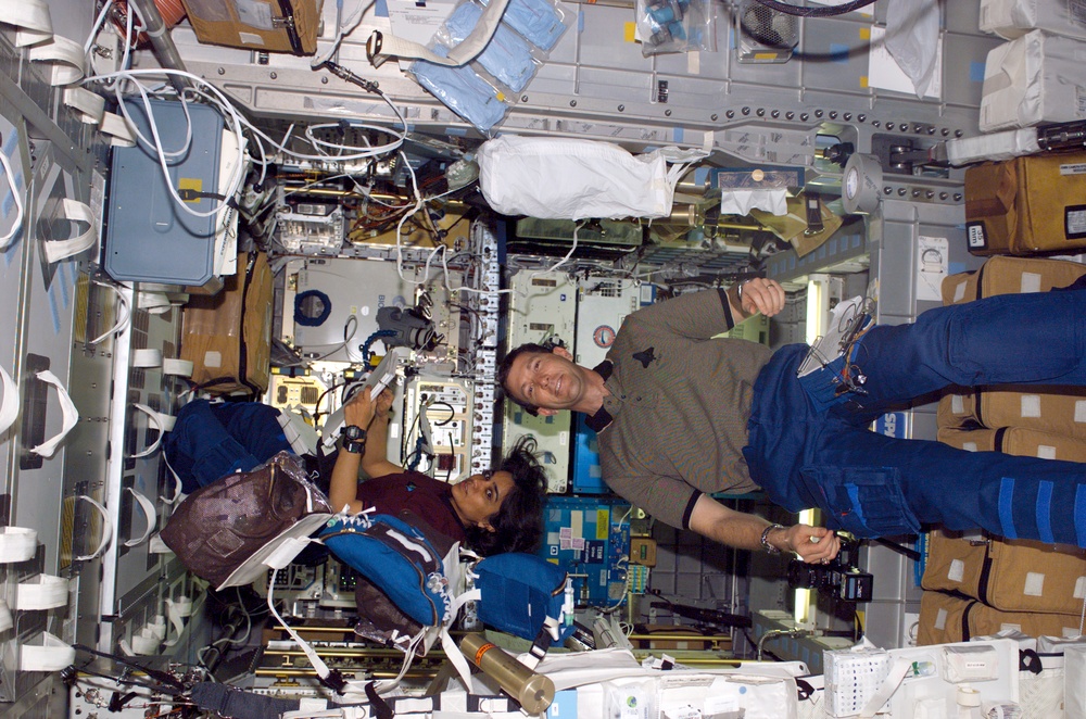 Husband and Chawla at work in the Spacehab RDM during STS-107